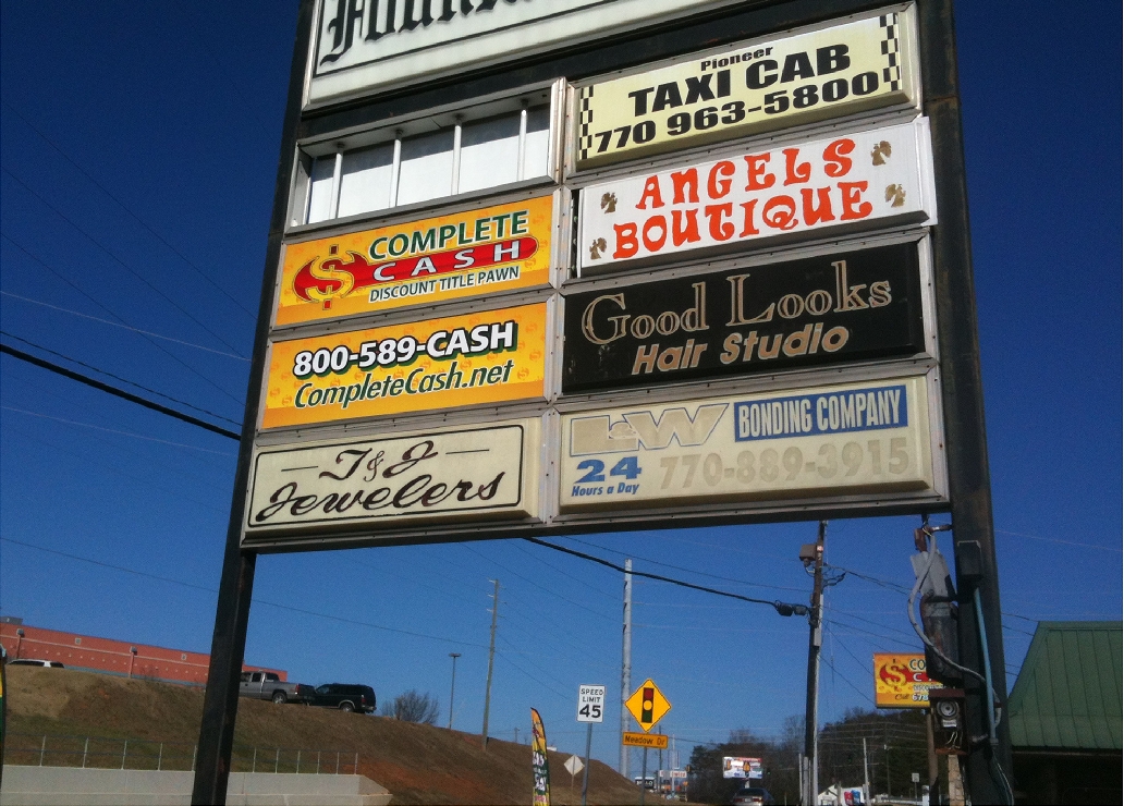 Business Name in Shopping Center Pylon Sign